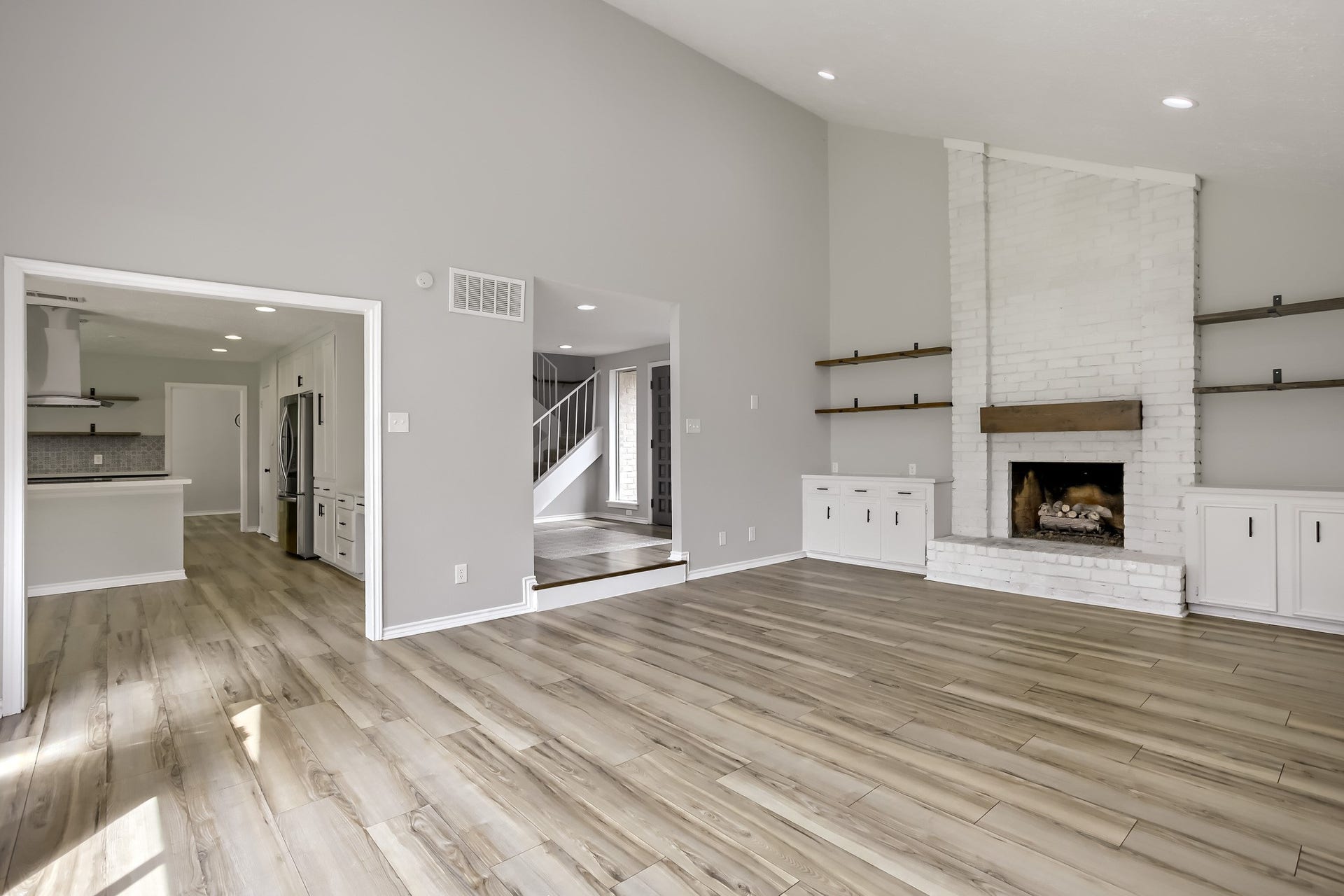 16505 Cornwall Street, Jersey Village, TX 77040 Spacious den seamlessly connects to the dining and kitchen areas, perfect for entertaining.
