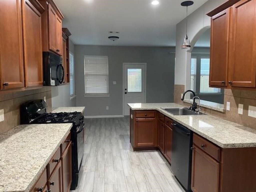 22438 Toronado Ridge Lane, Porter, TX 77365 Kitchen area with a refrigerator
