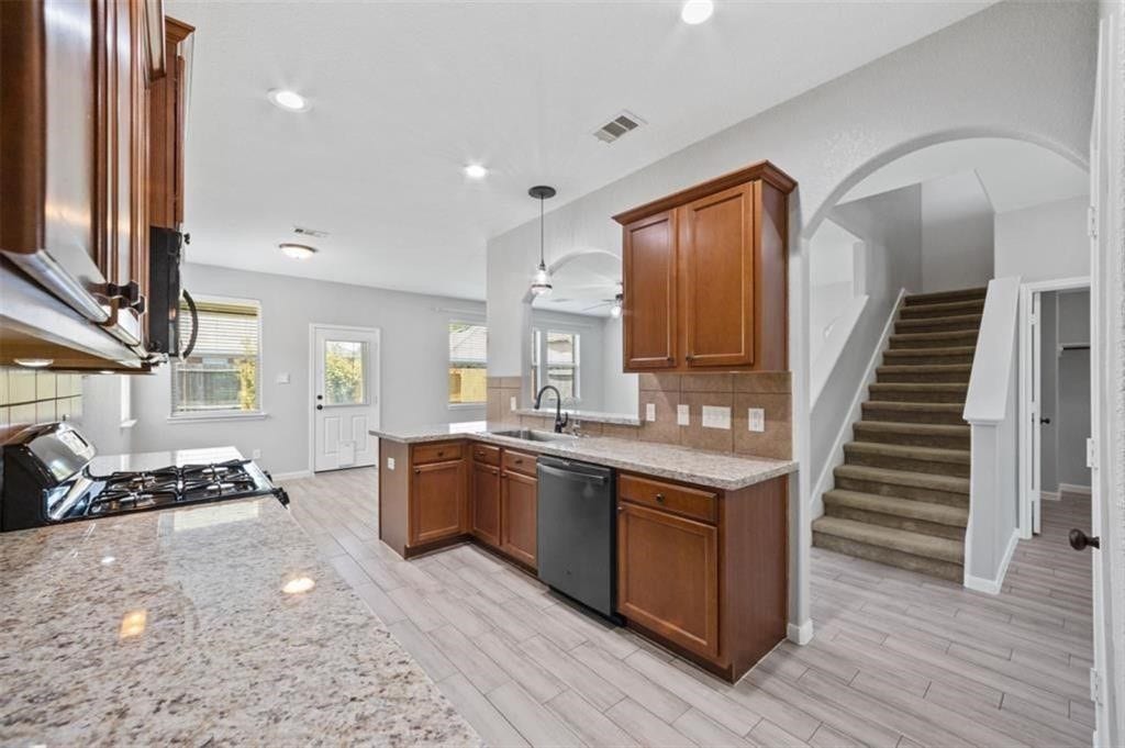22438 Toronado Ridge Lane, Porter, TX 77365 Kitchen area with beautiful granite counters!