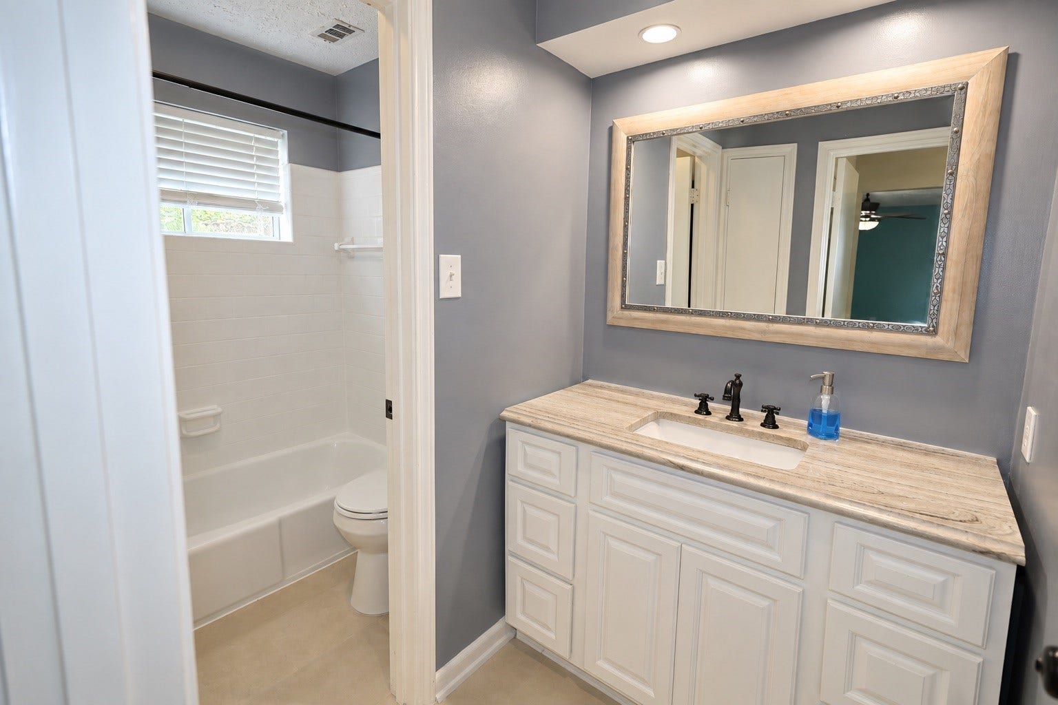 12034 Meadowdale Drive, Meadows Place, TX 77477 Primary bathroom with vanity and tub/shower combo