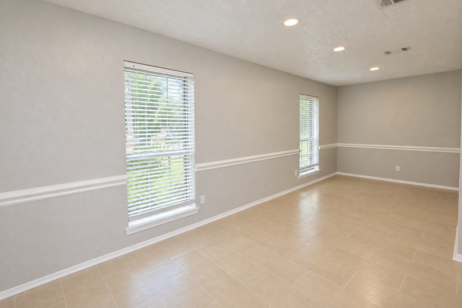 12034 Meadowdale Drive, Meadows Place, TX 77477 Large formal living/dining combo in the front of the home
