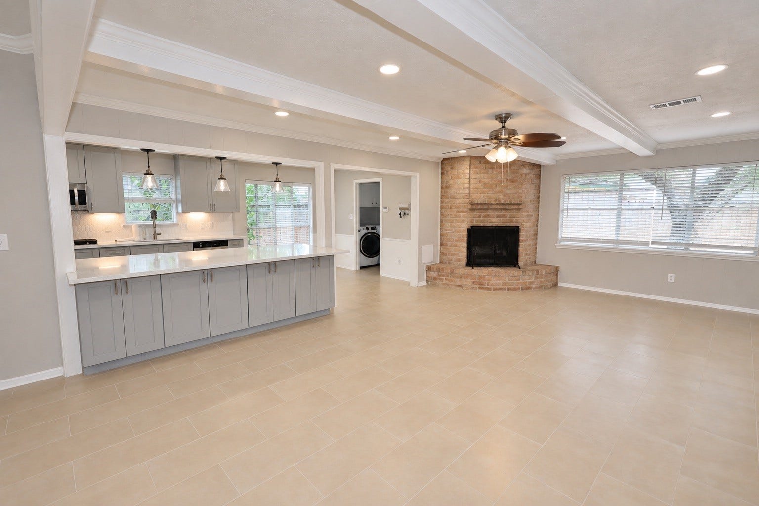 12034 Meadowdale Drive, Meadows Place, TX 77477 Living room view features plenty of natural light and a gas connection or wood burning fireplace