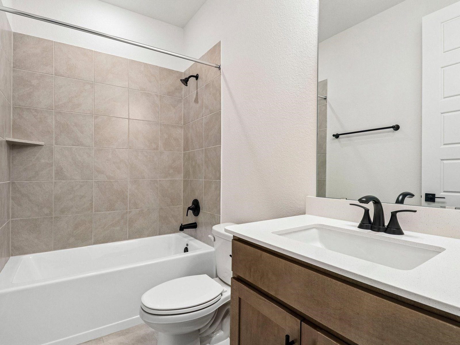 First Full Bathroom with tub and shower