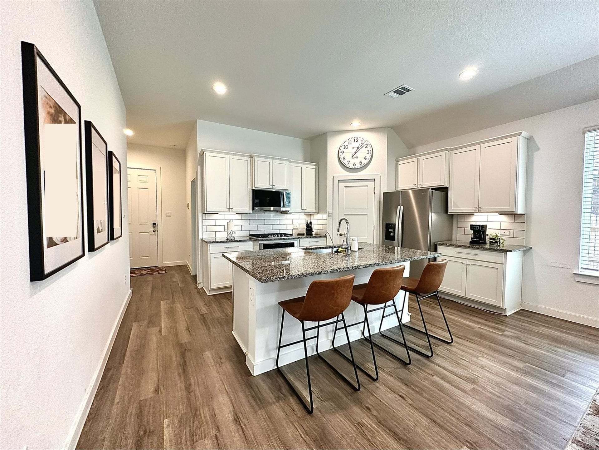 Beautiful Kitchen with granite countertops and cooktop