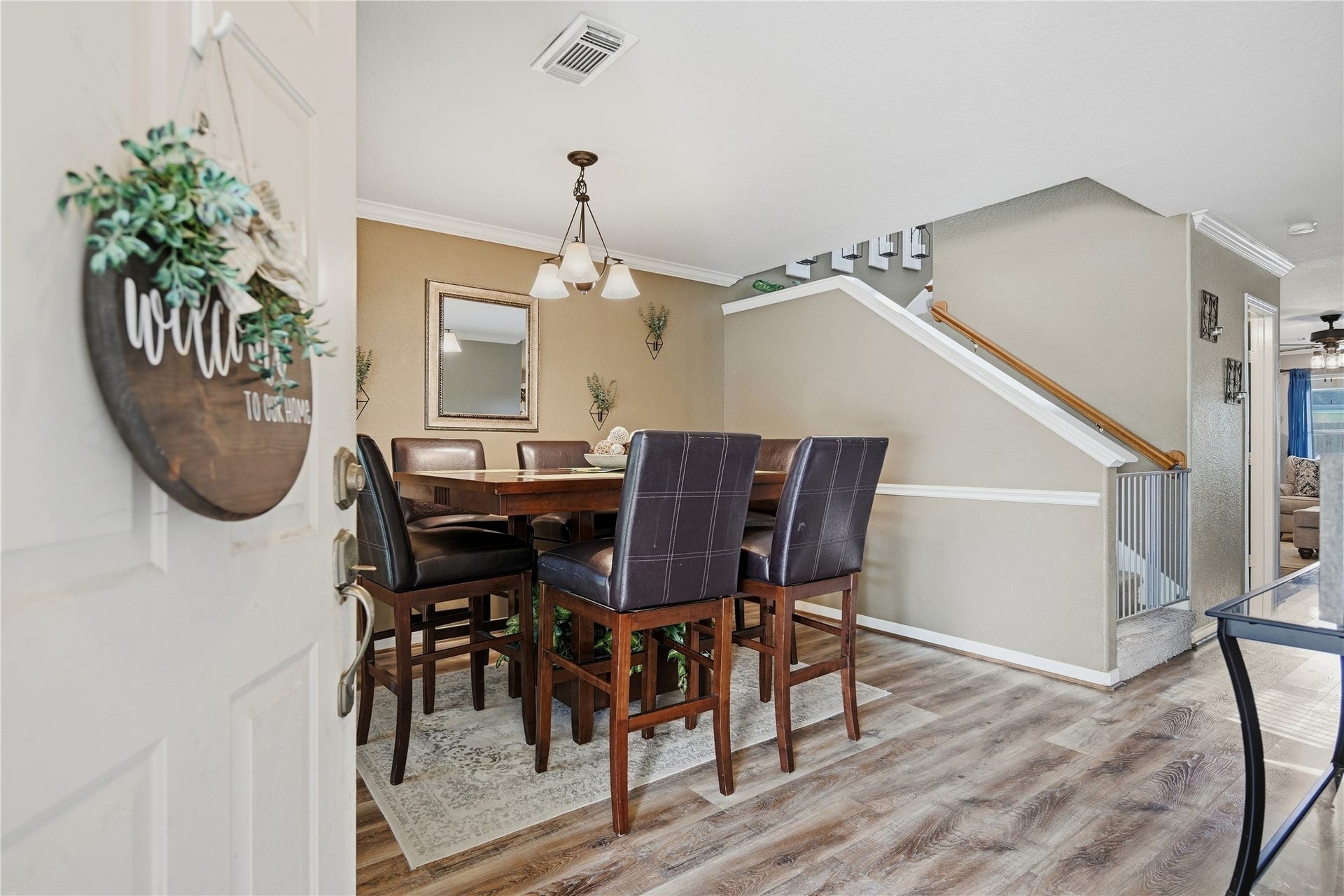 9414 Sagehampton Court, Spring, TX 77379 Greeted with formal or casual dining area with crown and chair molding as asn accent