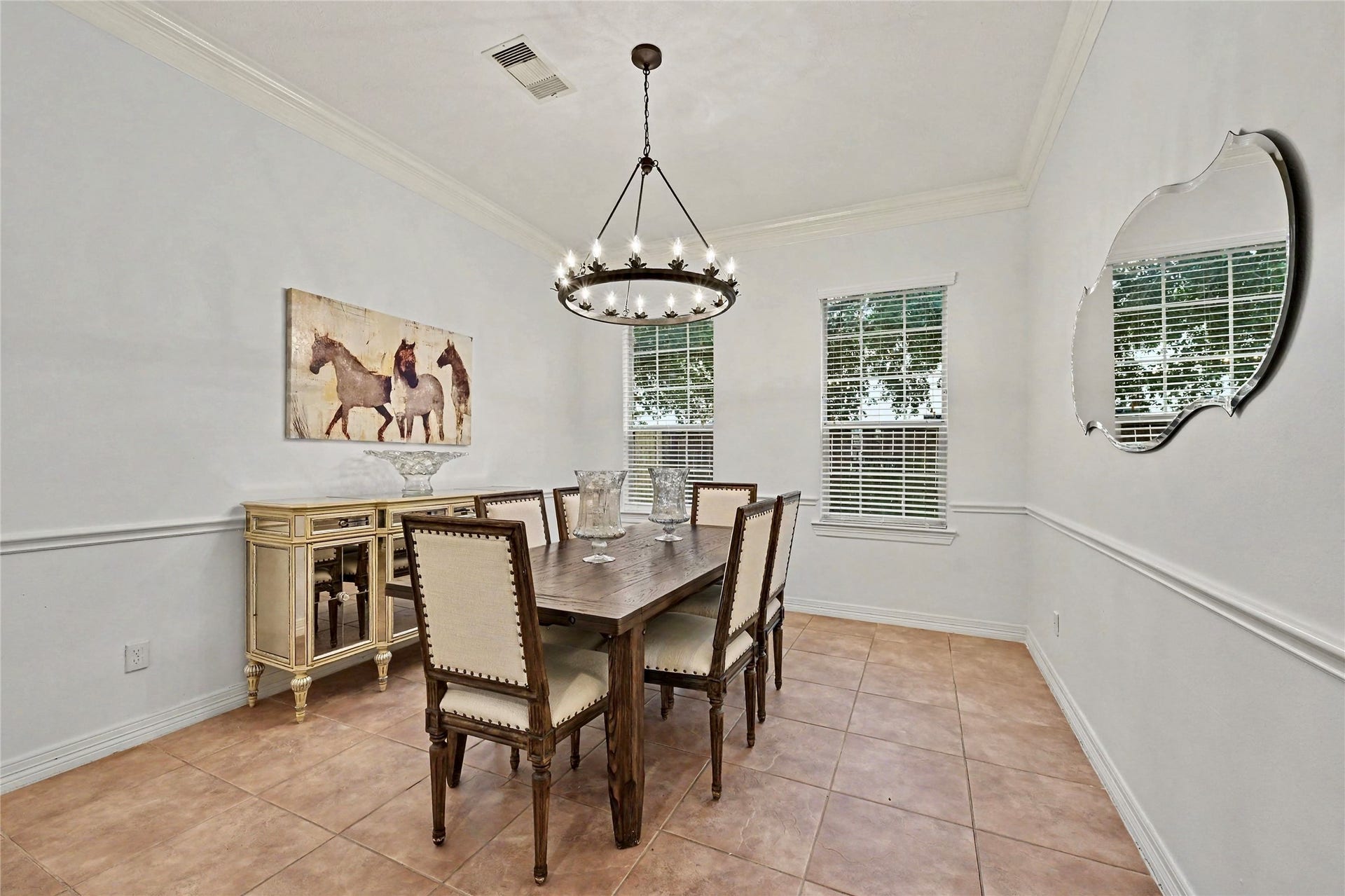 Bright formal dining area with tile flooring and an inviting, open feel.