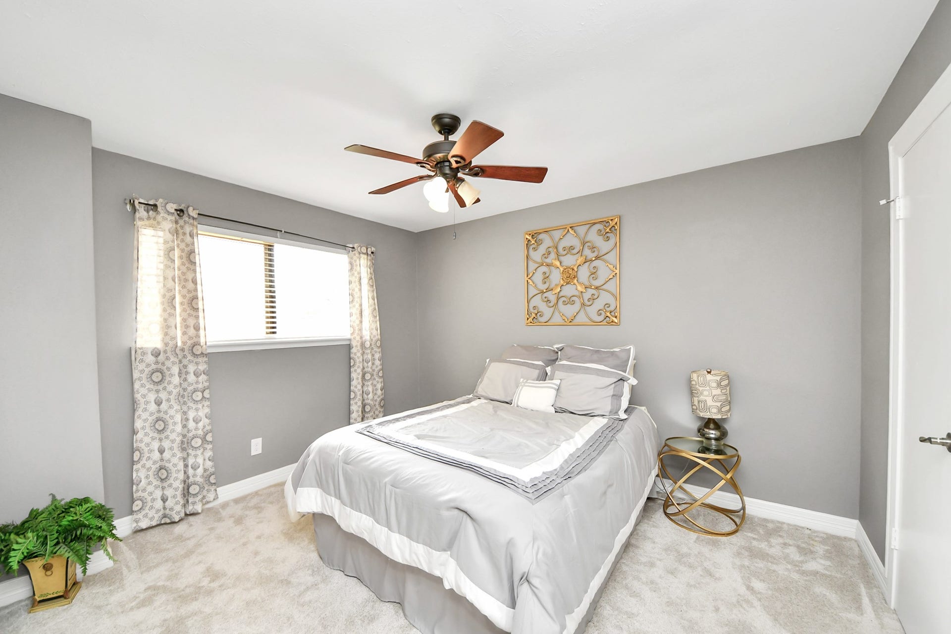 1710 Mayweather Lane, Richmond, TX 77406 Another comfortable secondary bedroom featuring plush carpet, neutral finishes, and an updated ceiling fan.