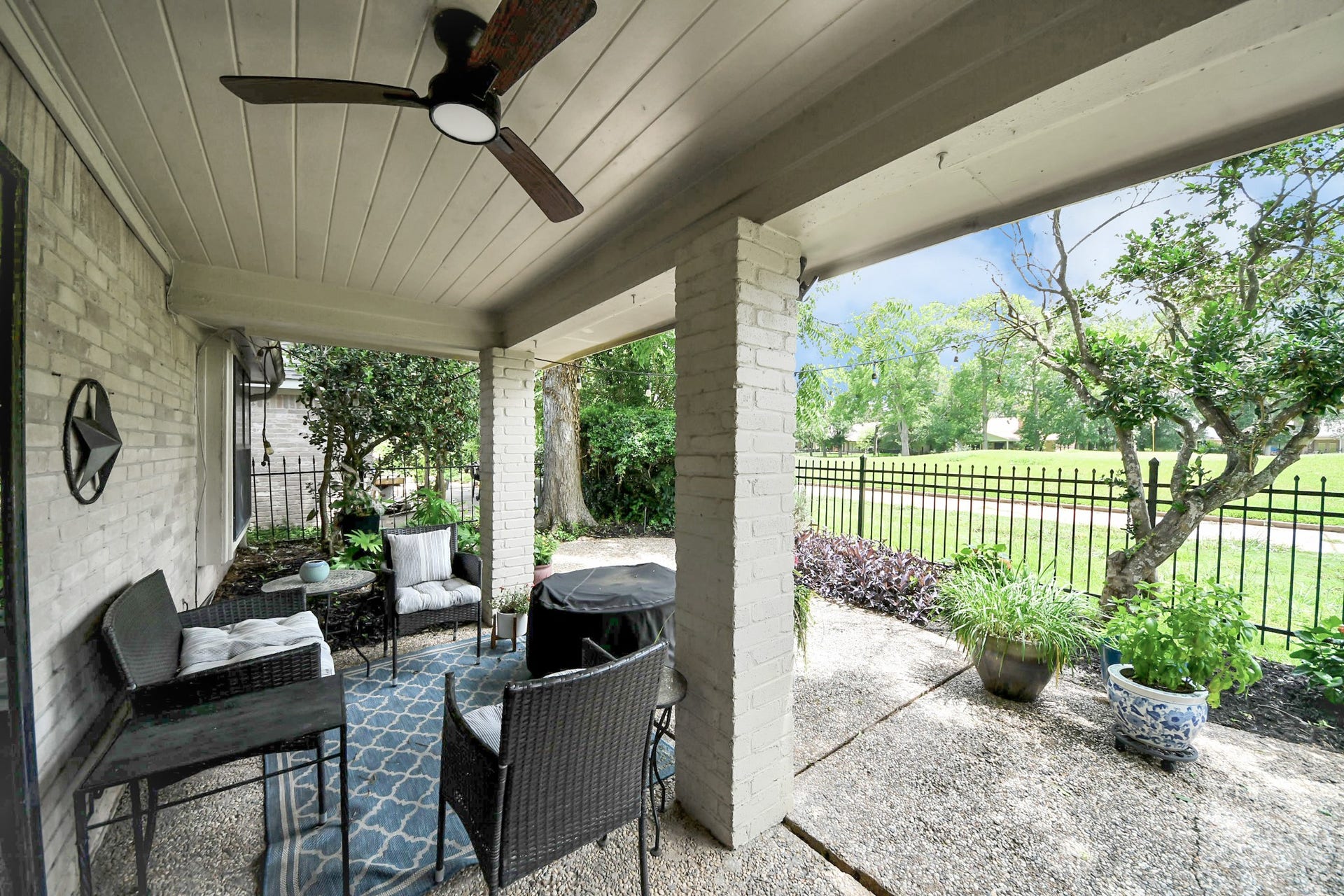 1710 Mayweather Lane, Richmond, TX 77406 The backyard combines a fenced courtyard setting for outdoor living with direct golf course access to create a private retreat.