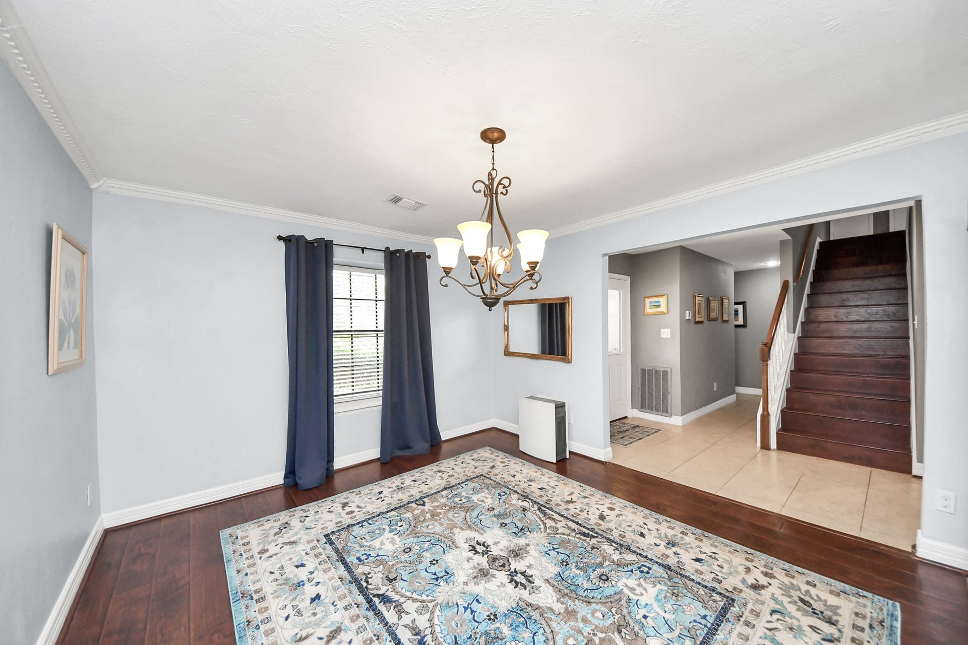 1710 Mayweather Lane, Richmond, TX 77406 The dining room combines hardwood flooring, crown molding, and an easy flow to the adjacent living spaces.