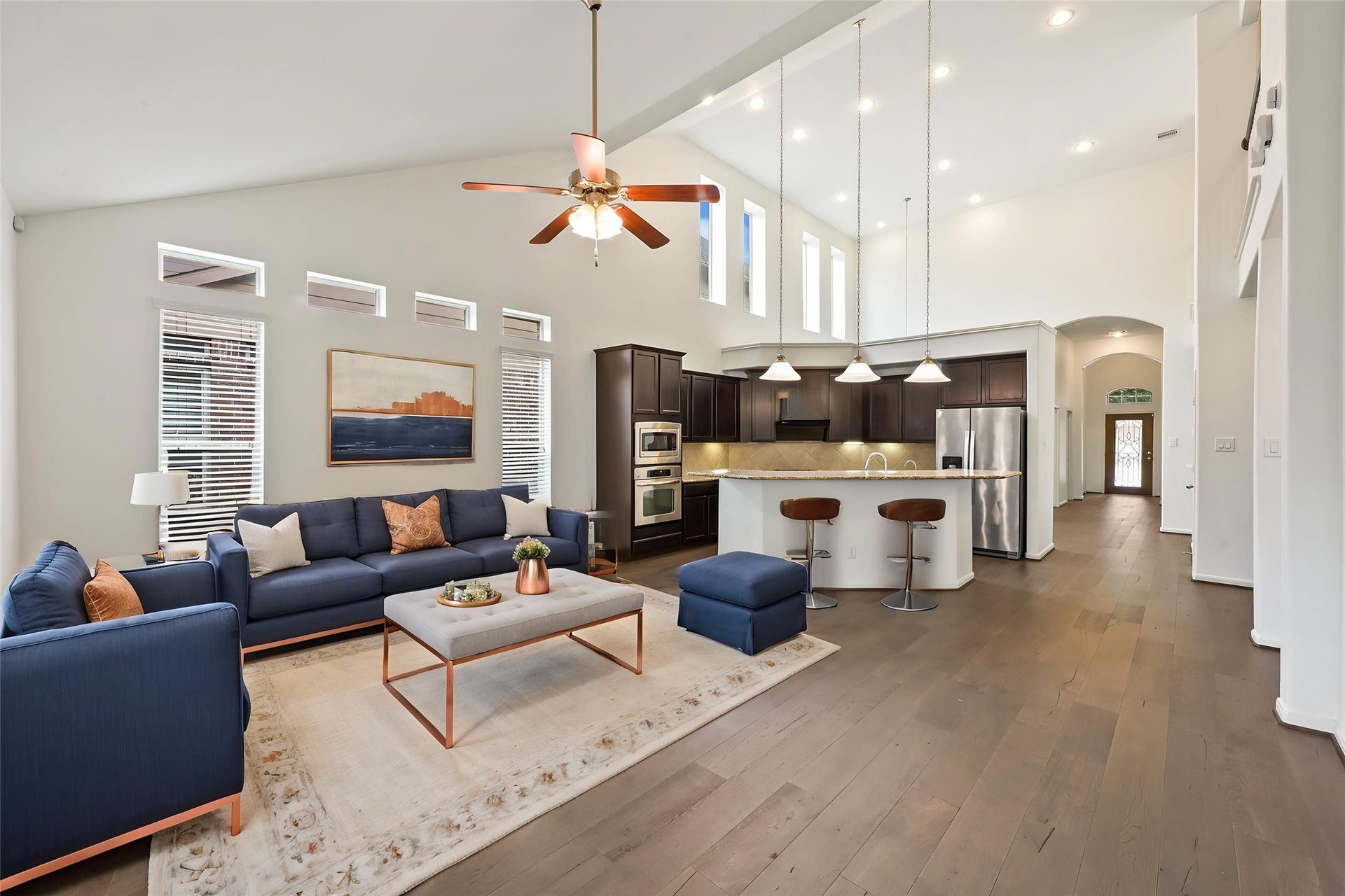 Open-concept design creates seamless flow between kitchen and living spaces.