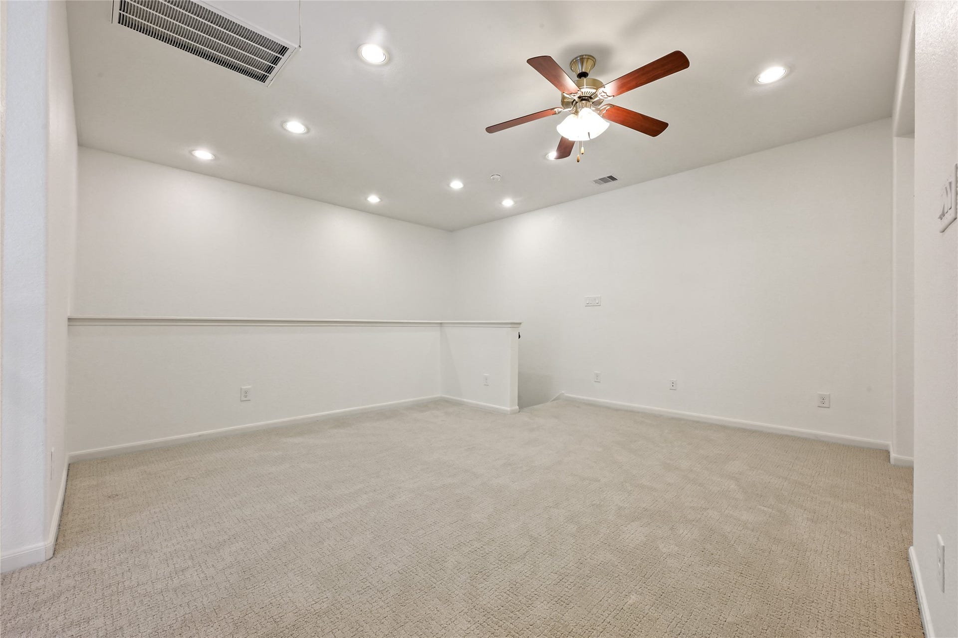 Full upstairs bathroom serving secondary bedroom and game room.