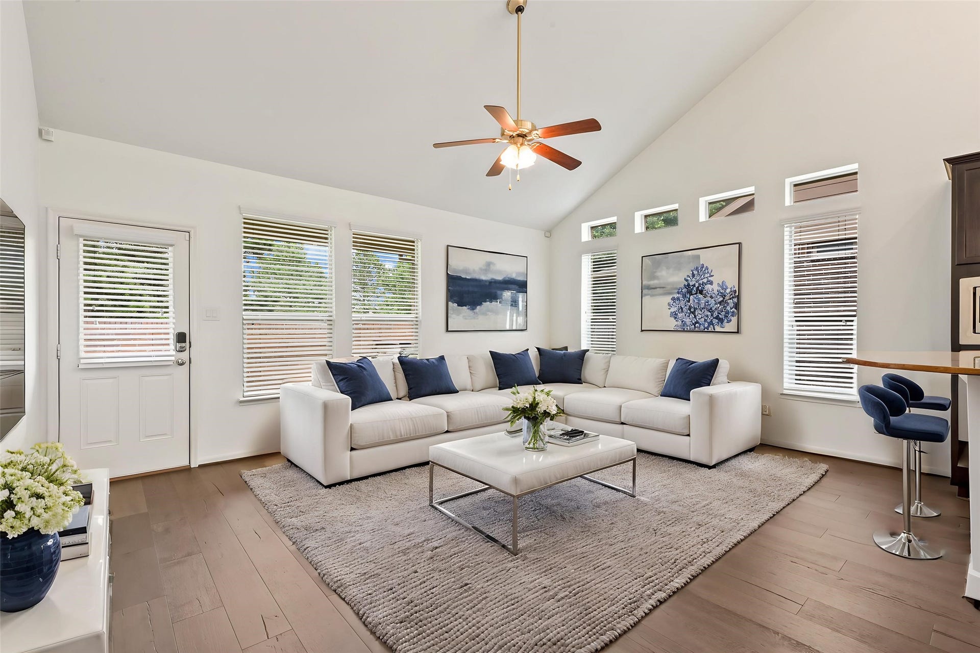 Spacious family room with high ceilings and open layout for entertaining.