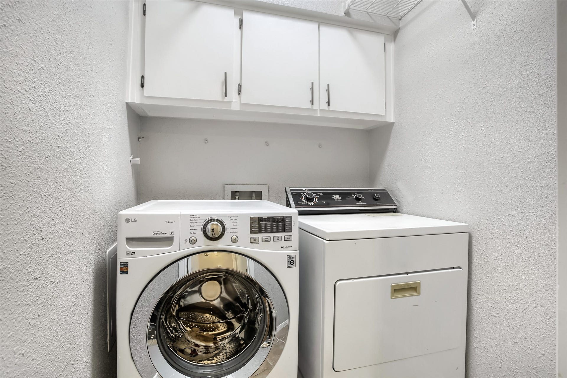 1818 Augusta Drive, #13, Houston, TX 77057 WASHER/DRYER INCLUDED. Cabinets with Shelving/Hanging on both sides