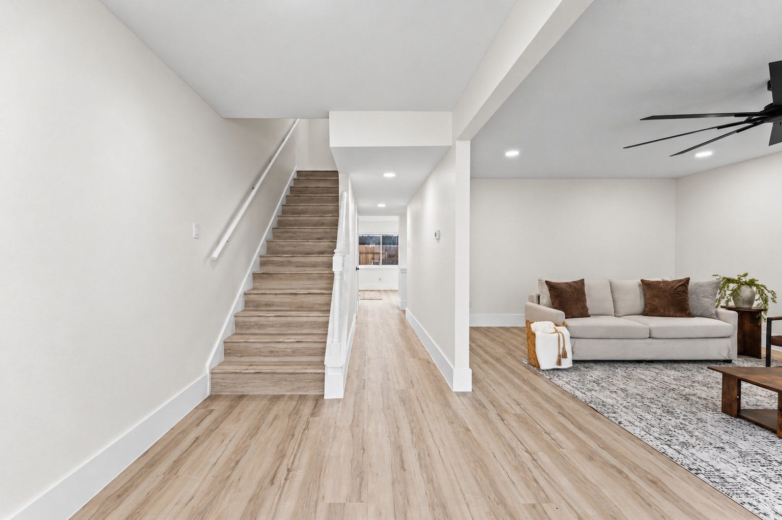 When you first walk in the front door, the living space is greeted by you on your right