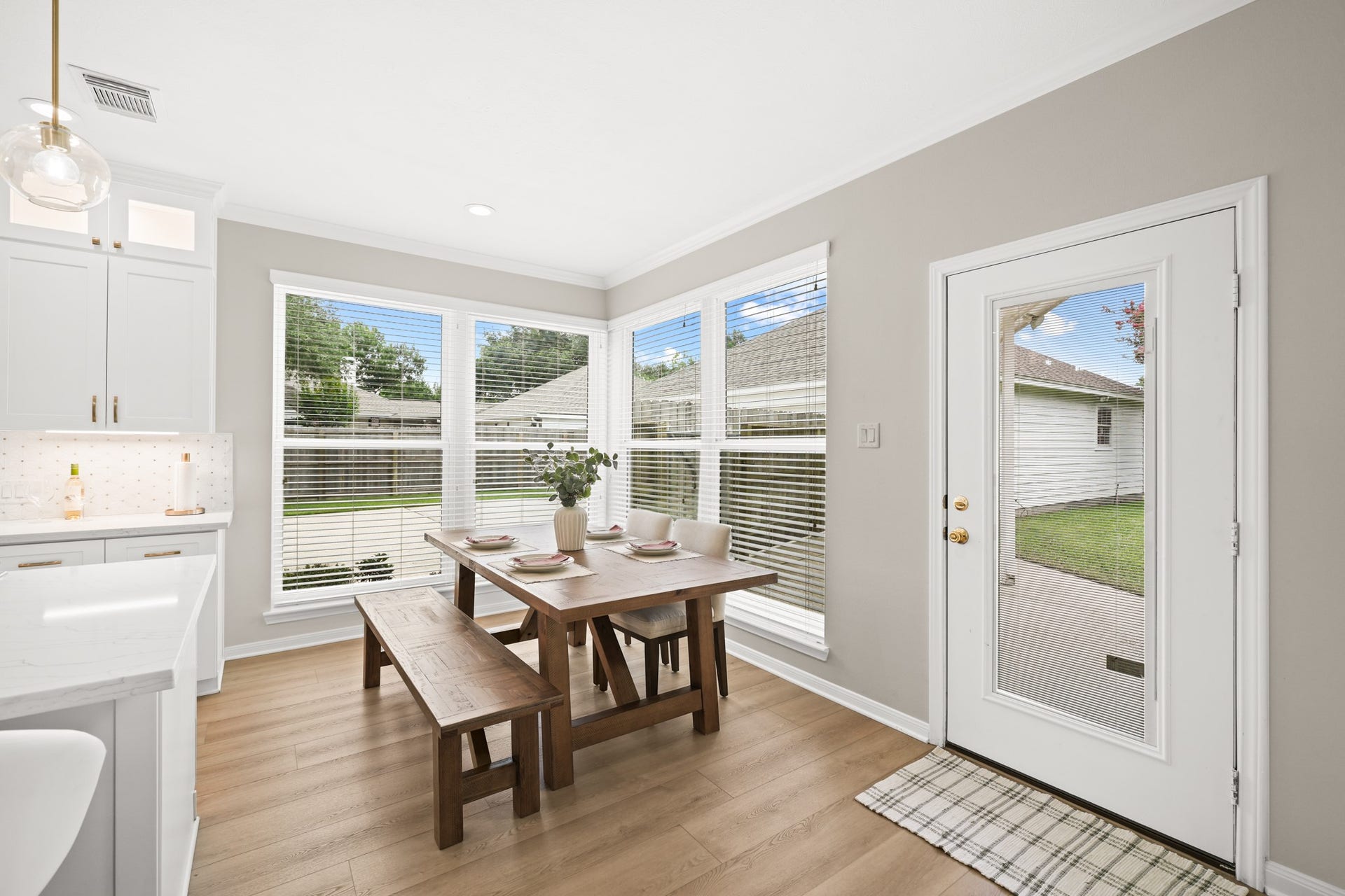 403 Trail Head Street, Friendswood, TX 77546 Sunlit breakfast area with backyard views and direct patio access.