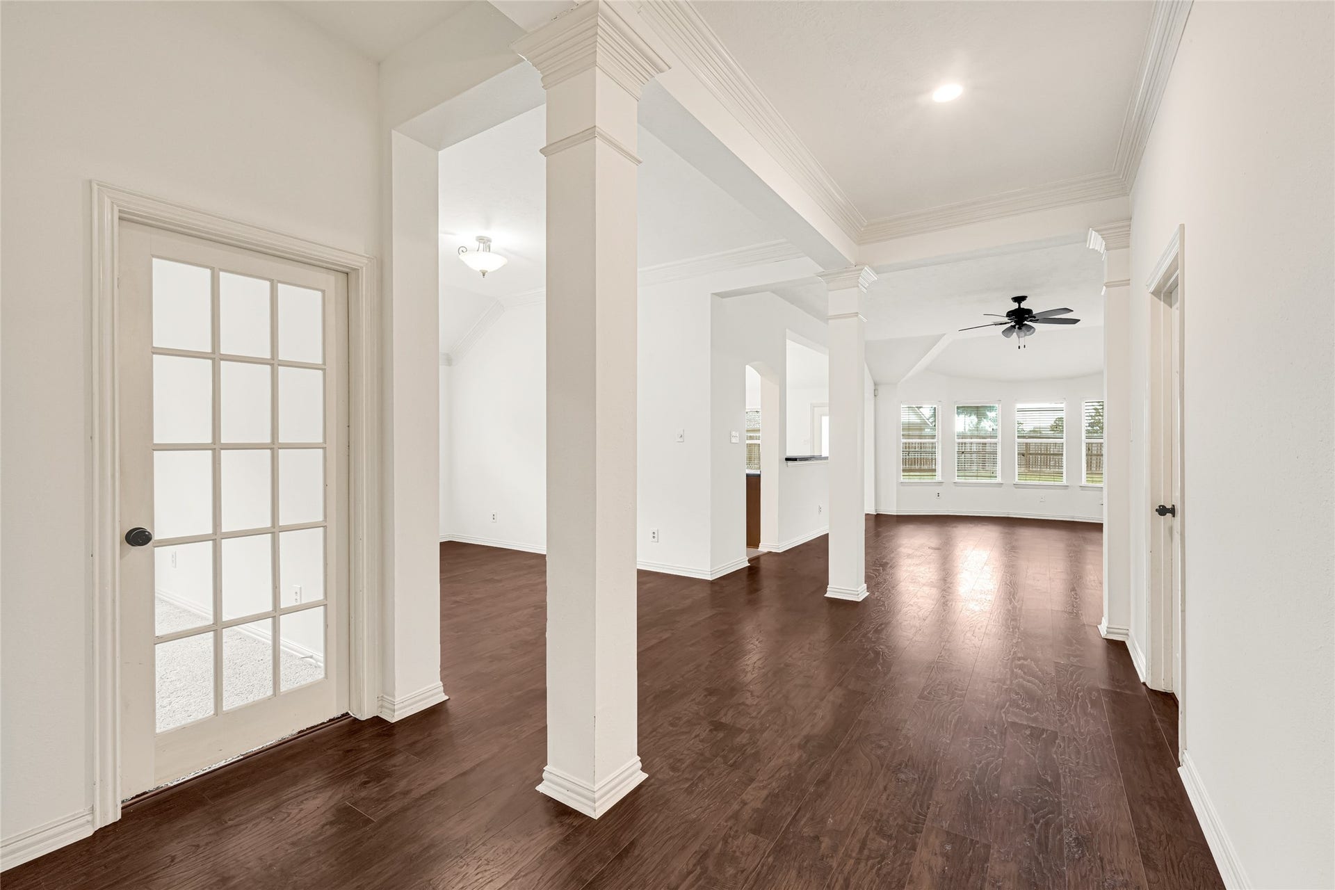 7102 Hollow Field Lane, Cypress, TX 77433 Breathtaking open-concept layout that seamlessly connects the formal dining area and the entry foyer to the main living room.