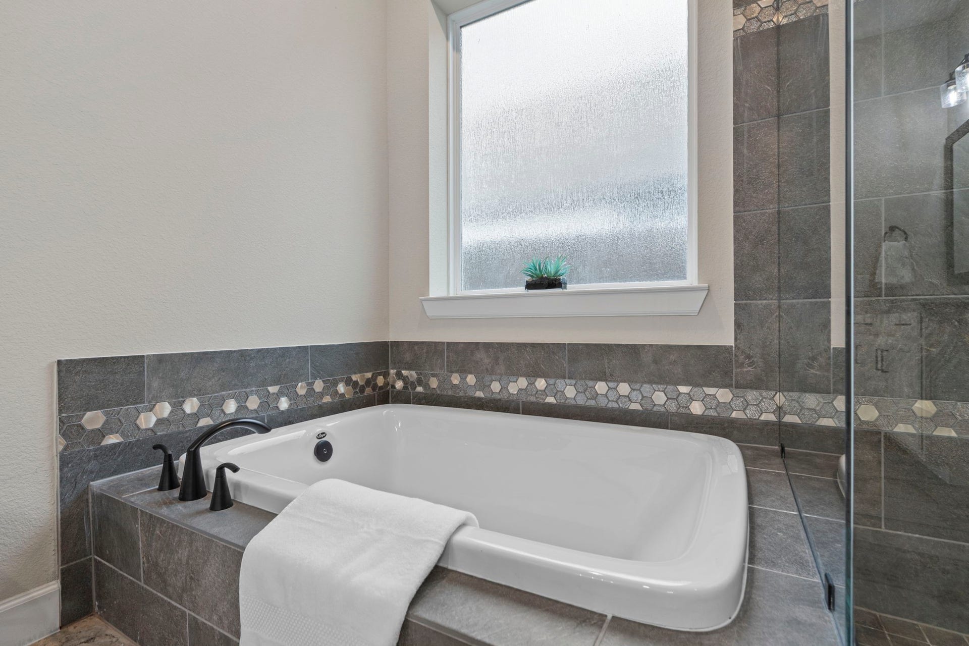 1806 Sienna Grove Drive, Missouri City, TX 77459 Primary bathroom with a separate shower and tub.