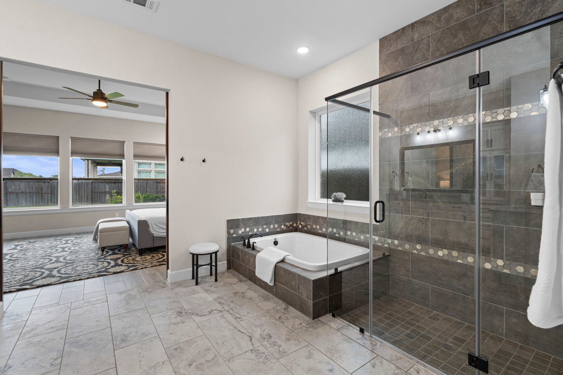 1806 Sienna Grove Drive, Missouri City, TX 77459 Primary bathroom with a separate shower and tub.