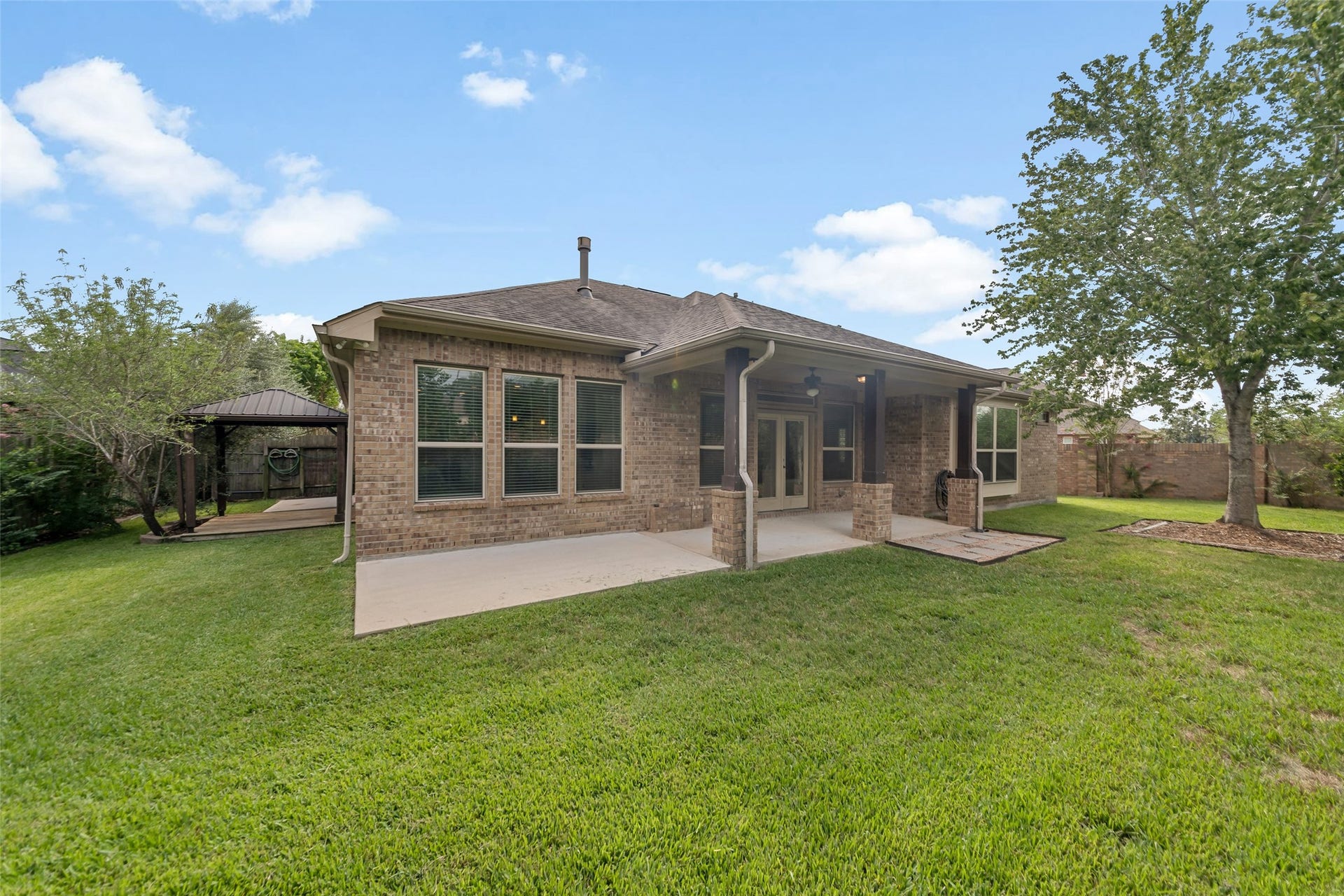 12218 Rampy Green Drive, Tomball, TX 77377 Brick exterior
