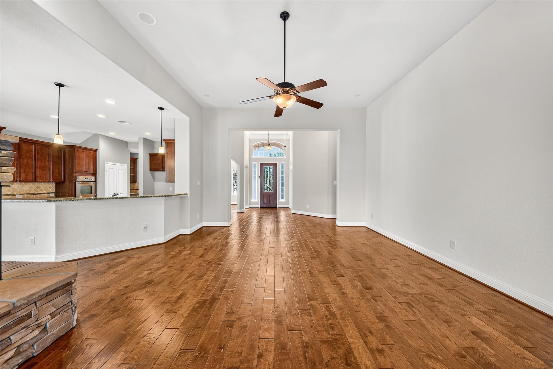 12218 Rampy Green Drive, Tomball, TX 77377 View from the living room towards the entryway.