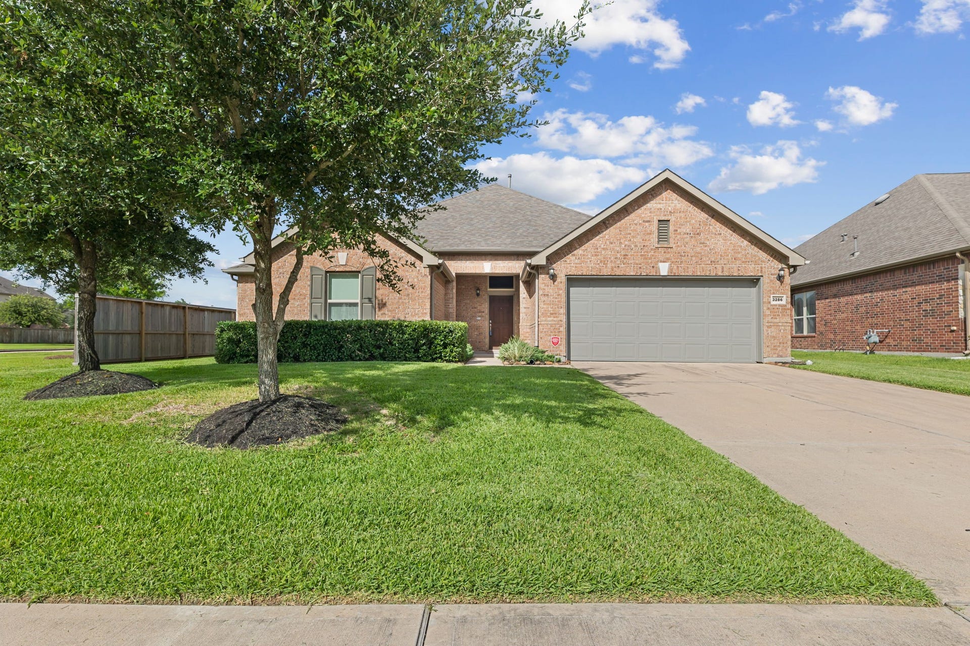 Welcome to 3286 Havenwood Chase Lane! This home offers a manicured lawn, mature trees, and a spacious two-car garage to enjoy.