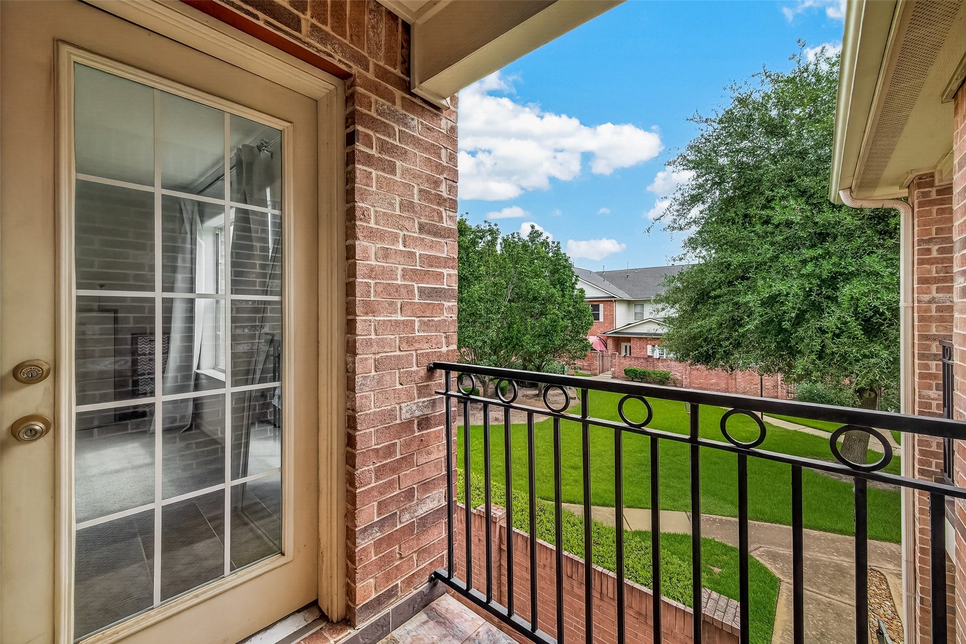 2865 Westhollow Drive, #43, Houston, TX 77082 Step outside directly from your bedroom to enjoy fresh air and peaceful tree-lined views.