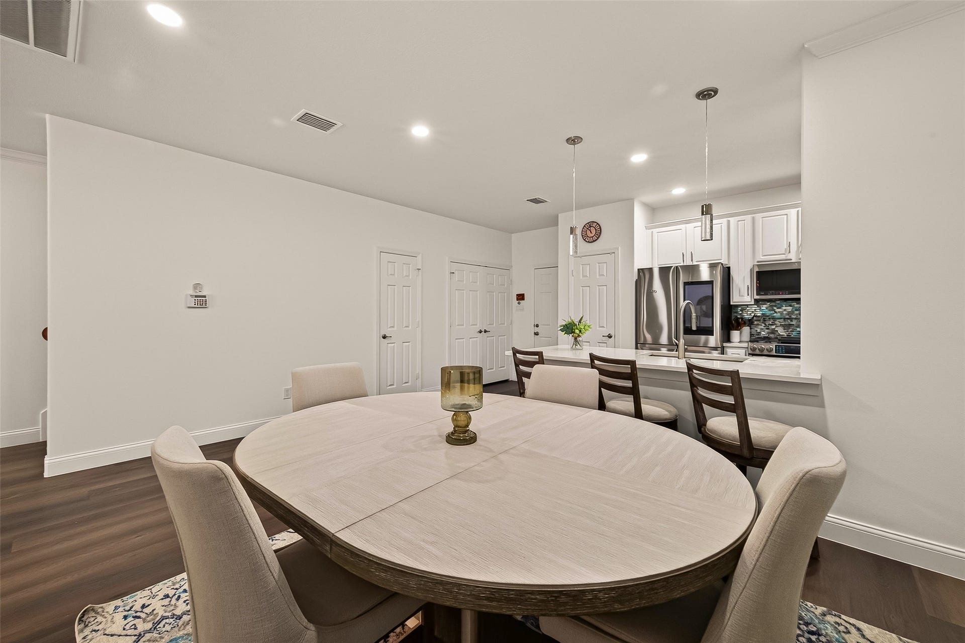 2865 Westhollow Drive, #43, Houston, TX 77082 Seamless connection between dining and living, creating a bright and airy heart of the home.