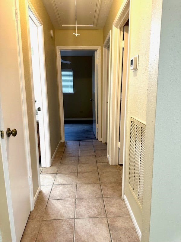 16022 Vista Del Mar Drive, Houston, TX 77083 hall to two small bedroom