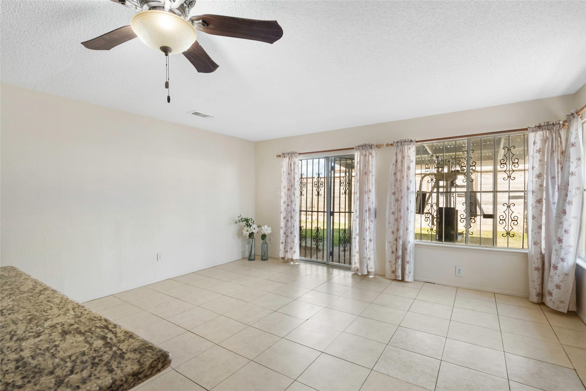 This large open area is light and bright and provides additional living space!