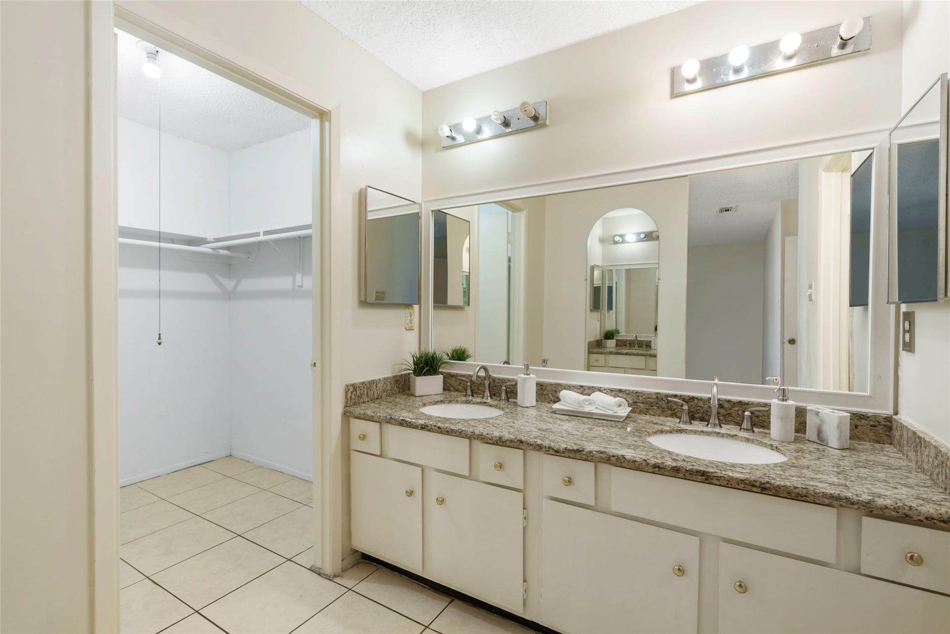 Large mirrors and closet are hallmarks of a great primary suite!
