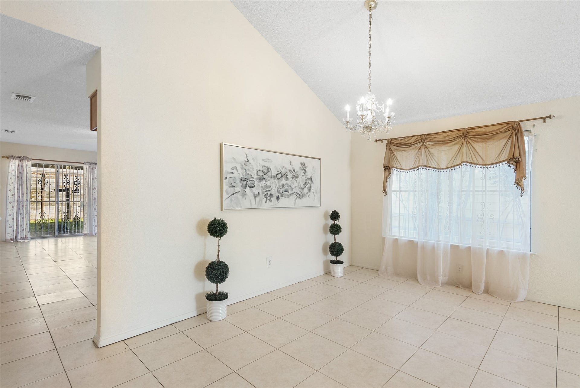 The living and dining room are open to each other, making entertaining a breeze!