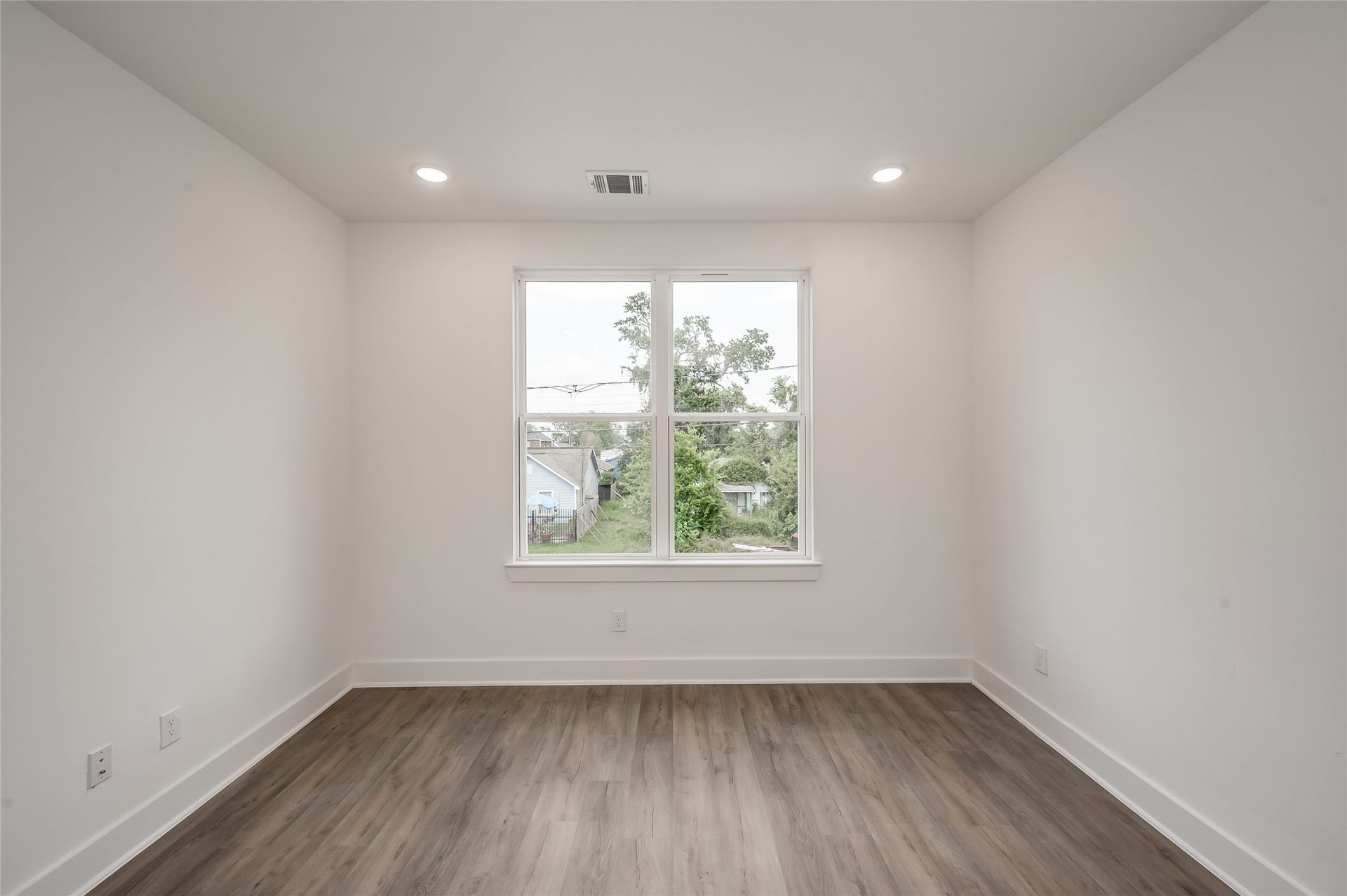 4605 Terry Street, Houston, TX 77009 Another bright secondary bedroom rounds out the upstairs living space
