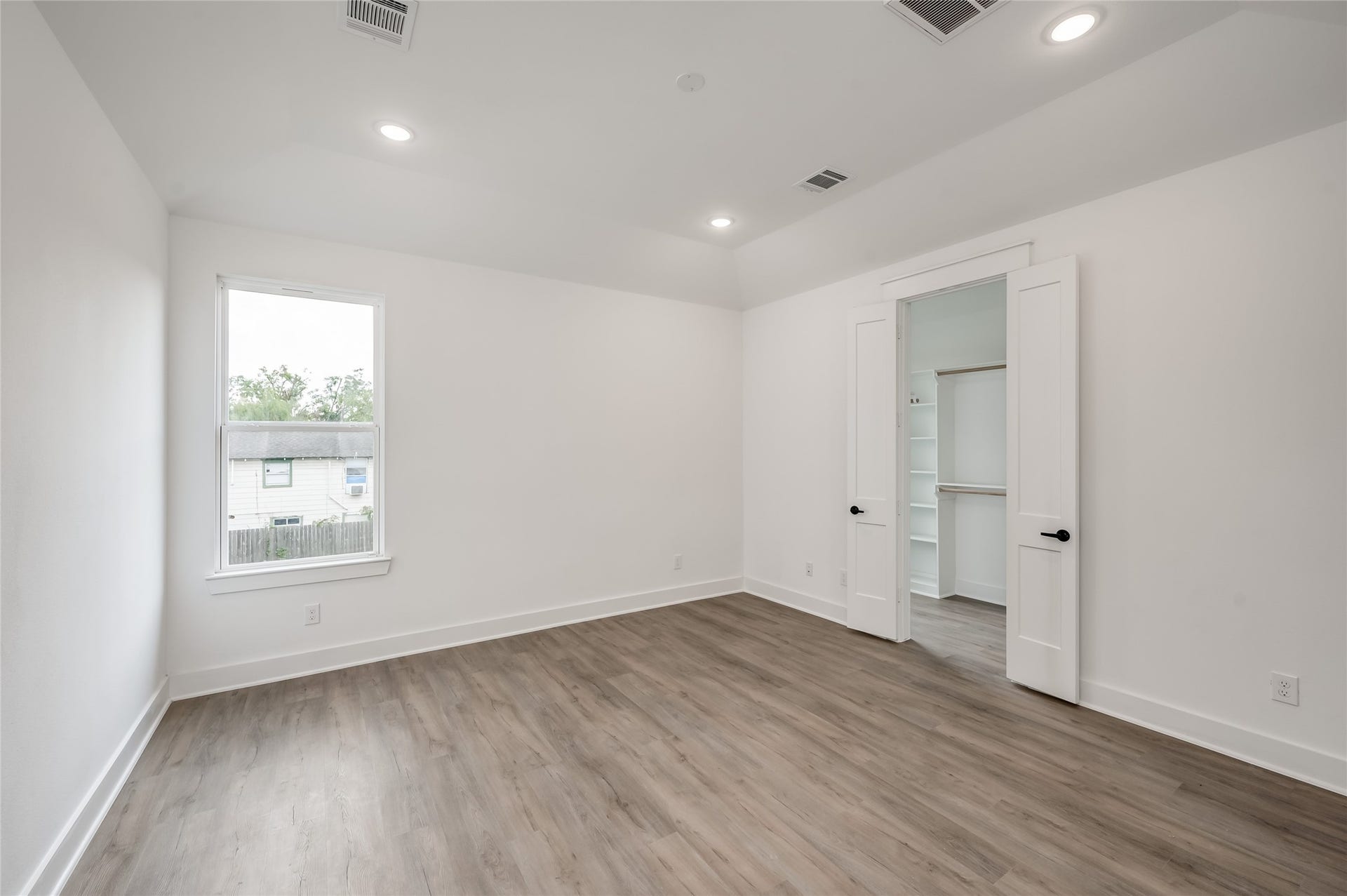 4605 Terry Street, Houston, TX 77009 The primary bedroom offers a quiet retreat upstairs, roomy enough to fully unwind at the end of the day