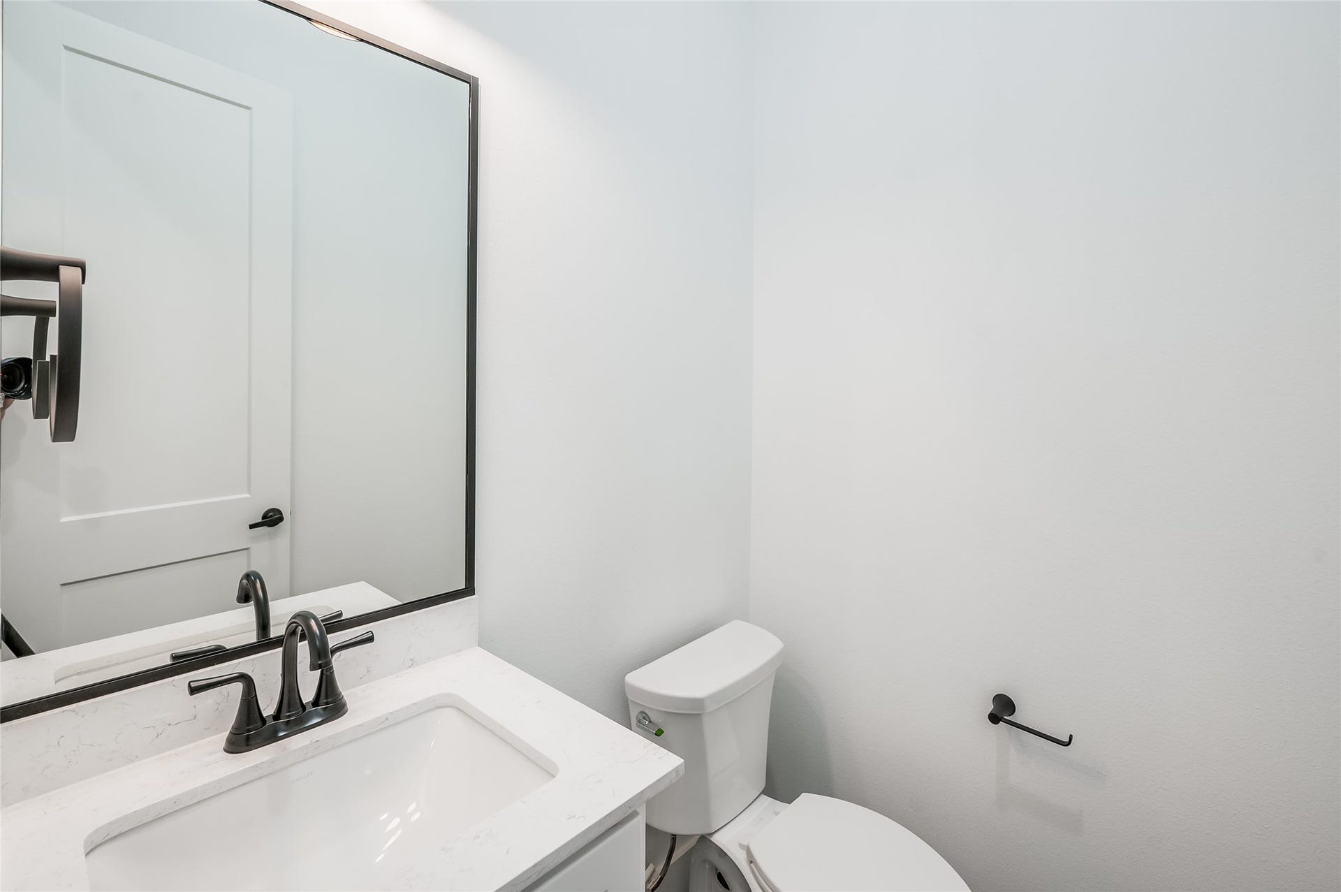 4605 Terry Street, Houston, TX 77009 A convenient powder bath on the first floor is ready for guests