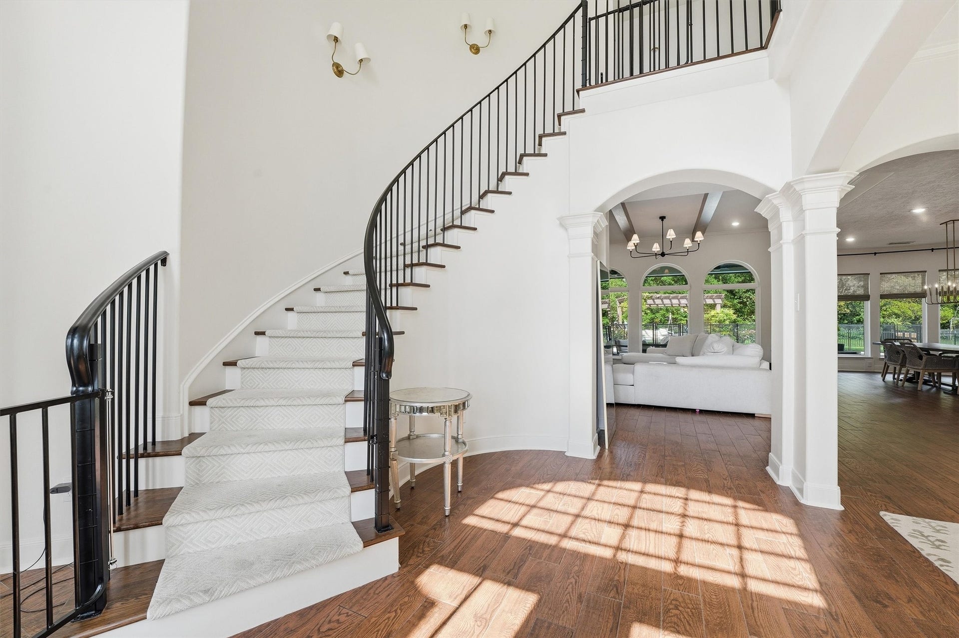 23210 Willowcreek Stables Road, Spring, TX 77389 Beautifully designed spiral staircase welcomes you in.