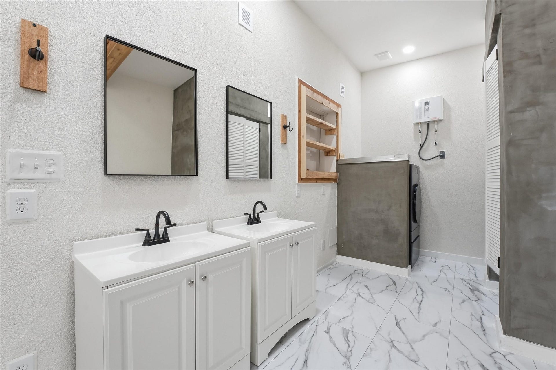 23210 Willowcreek Stables Road, Spring, TX 77389 Double vanities, micro cement accents, tile flooring. This is the nicest "gym bathroom" around.