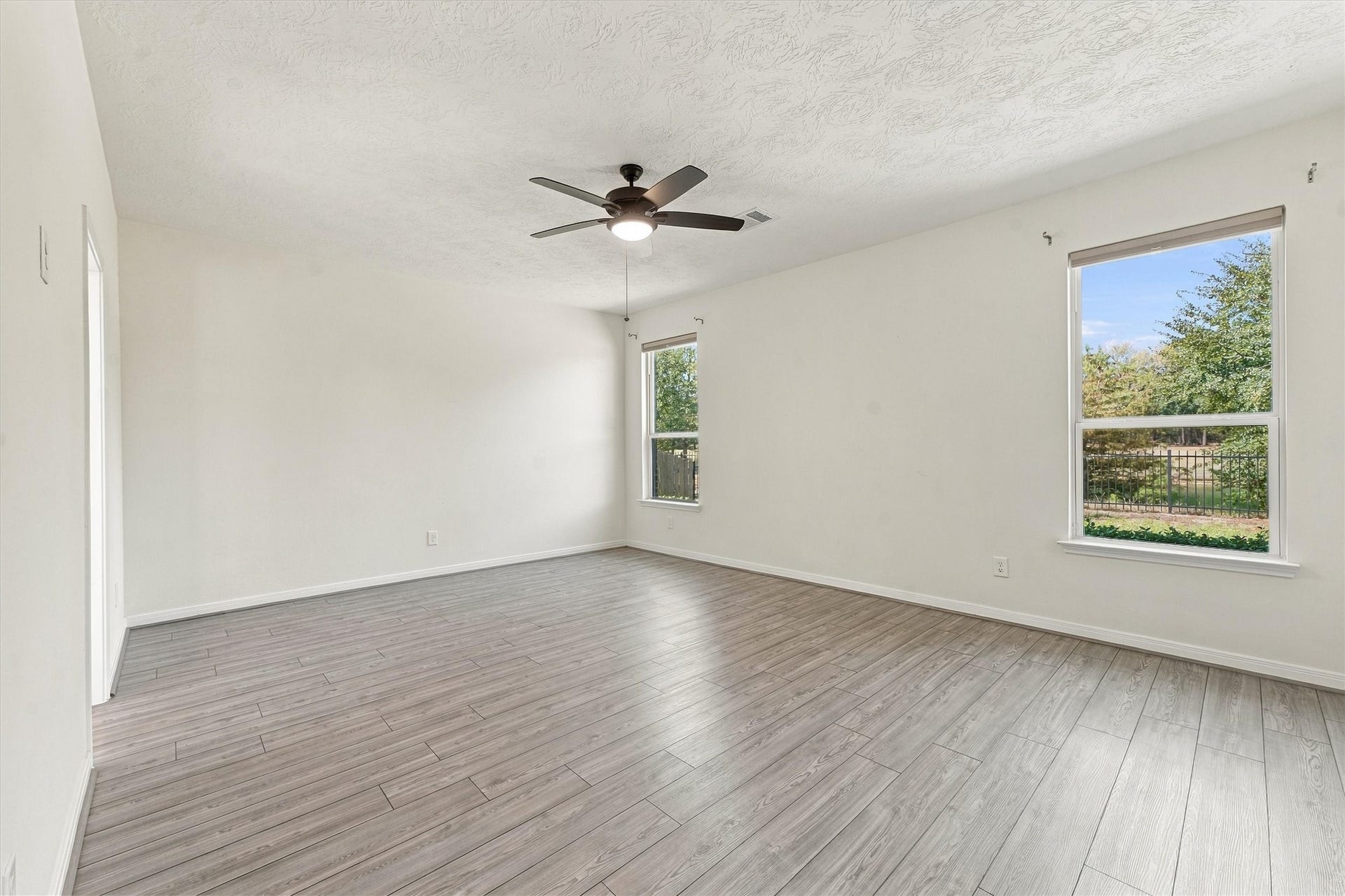 Primary suite offers great views of the water and golf course too!