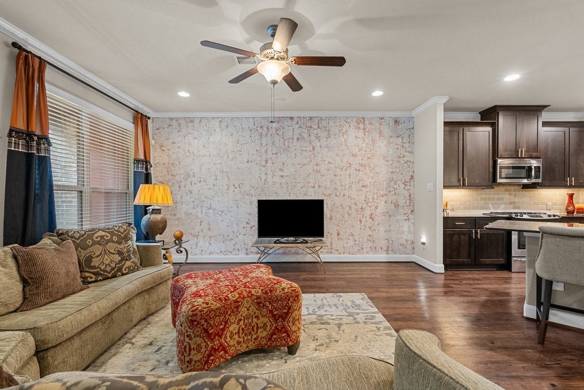 416 Via Regatta Drive, Webster, TX 77598 This former model home boasts high-end, upgraded finishes throughout its spacious 2,741 sq. ft. layout.