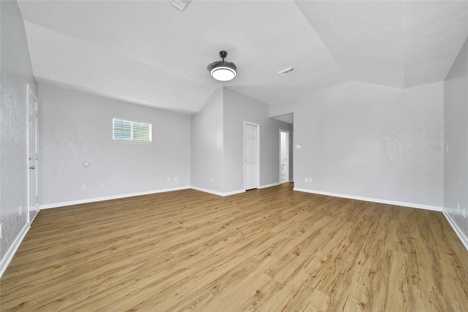 307 Lawrence Street, Tomball, TX 77375 The primary bedroom is HUGE and has a great spot for a home office.