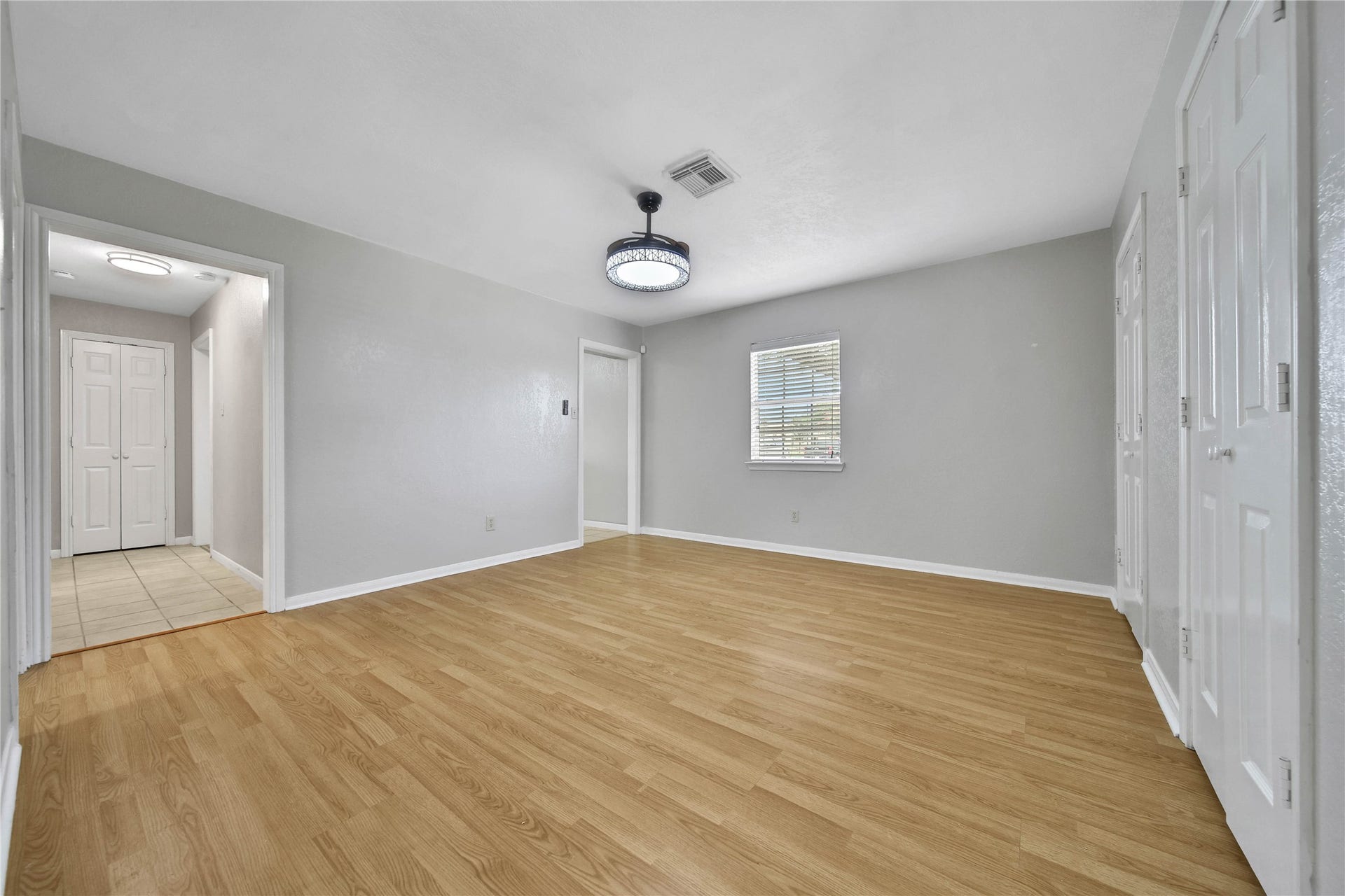 307 Lawrence Street, Tomball, TX 77375 Second view of the dining room, showing 2 storage closets.