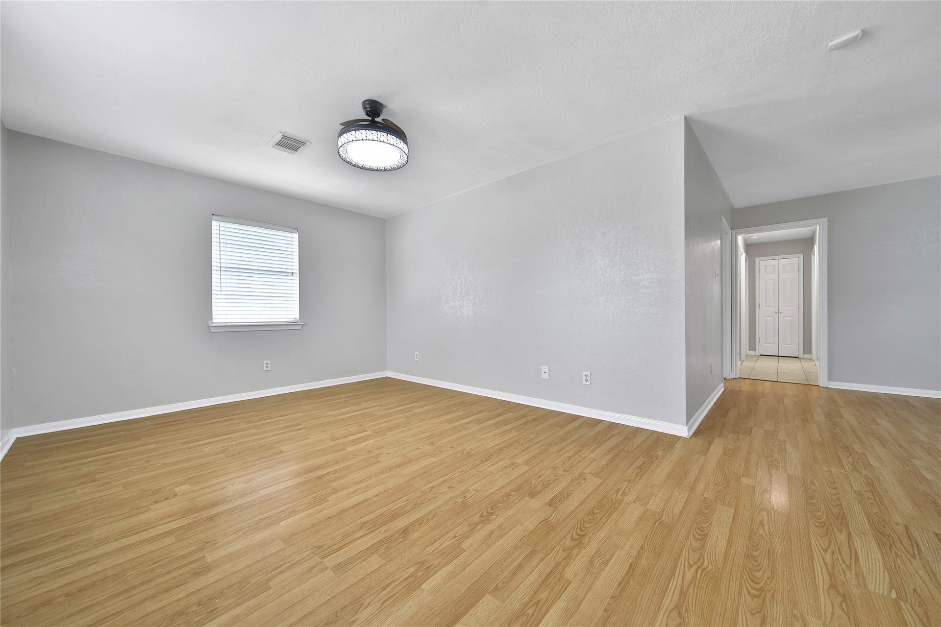 307 Lawrence Street, Tomball, TX 77375 The living room is open to the dining room.