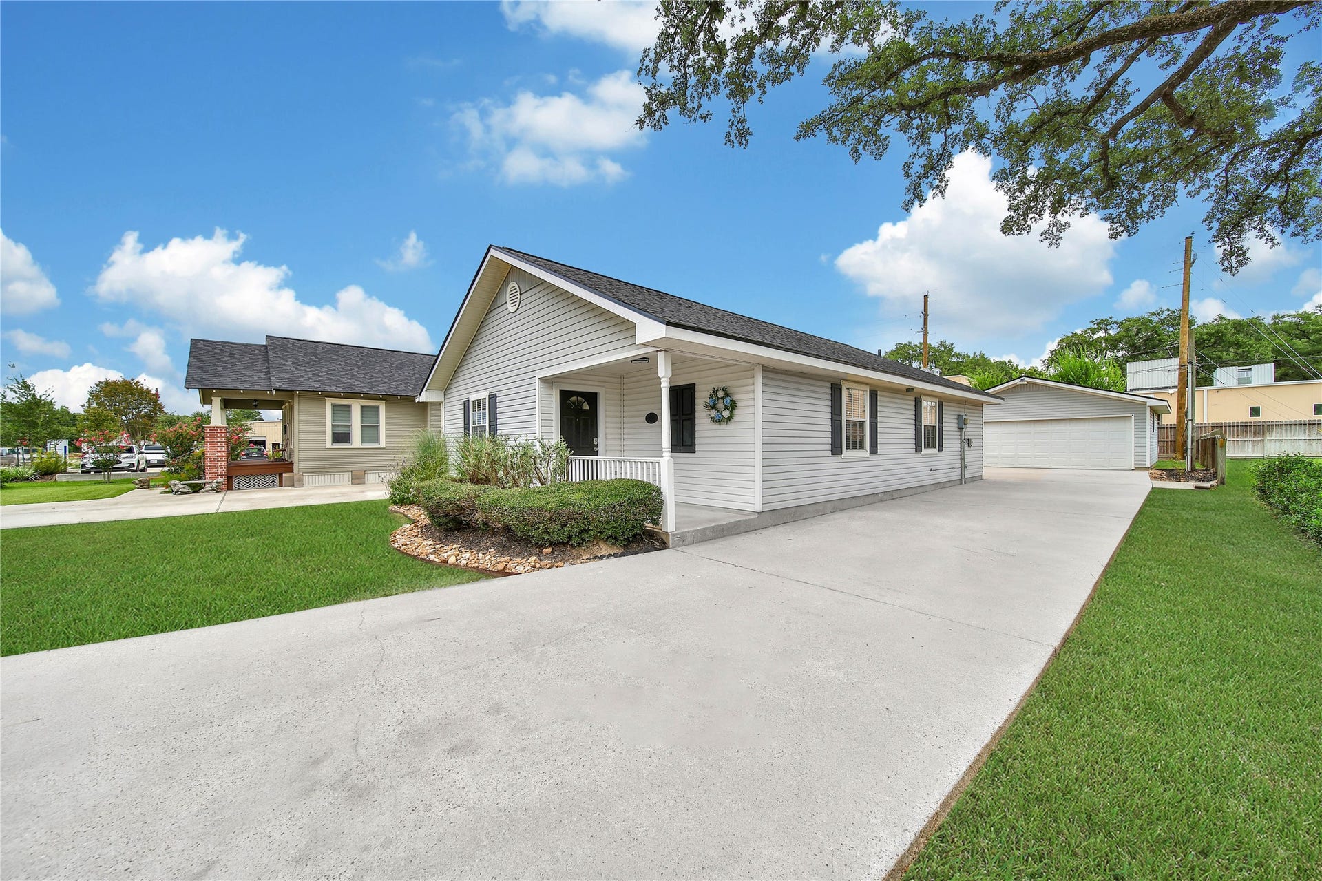 307 Lawrence Street, Tomball, TX 77375 Extended driveway, great for extra parking.