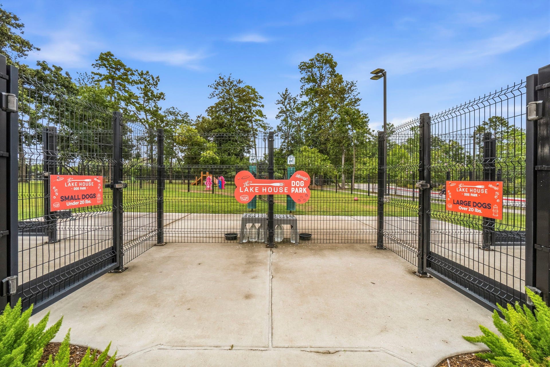 1147 Beals Creek Street, Conroe, TX 77304 Two fenced dog parks with separate areas for large and small dogs.