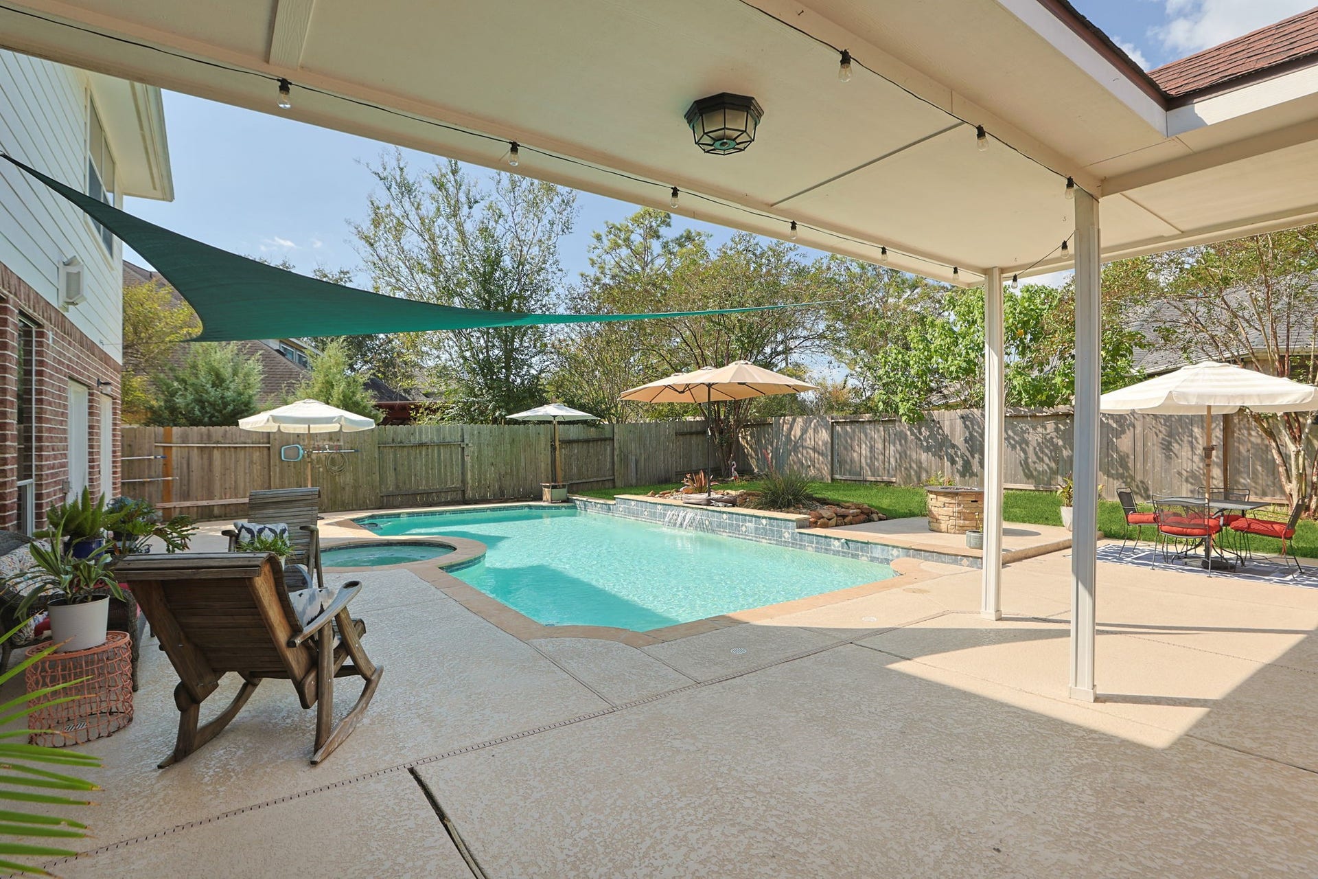 16319 Rolling View Trail, Cypress, TX 77433 Shade where you want and sun where you prefer. Lap pool and spa.