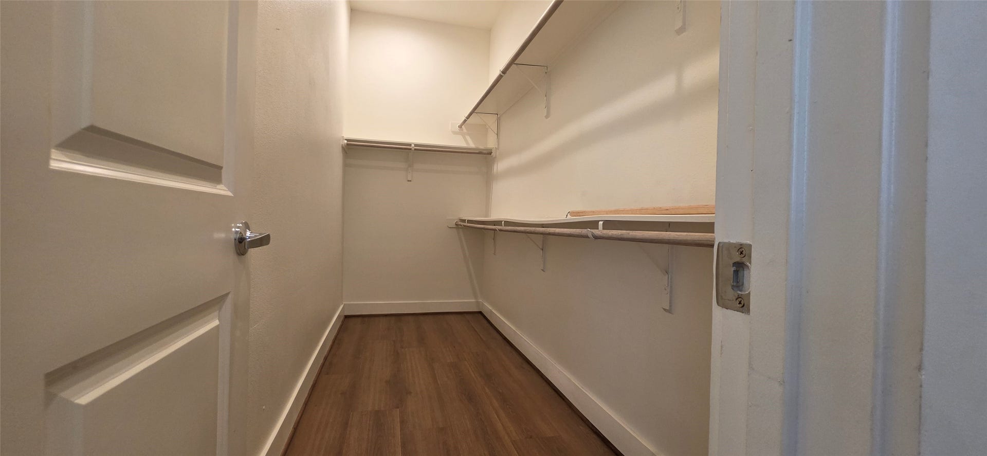 2980 Alice Street, Houston, TX 77054 Primary bedroom closet with laminate floors