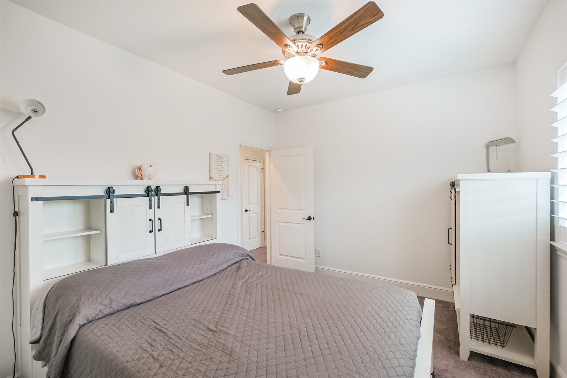 13611 Saddlebred Springs Lane, Cypress, TX 77429 Bright and spacious seventh bedroom offering generous proportions, abundant natural light, and a private en-suite bathroom, creating a comfortable and secluded retreat for family or guests.