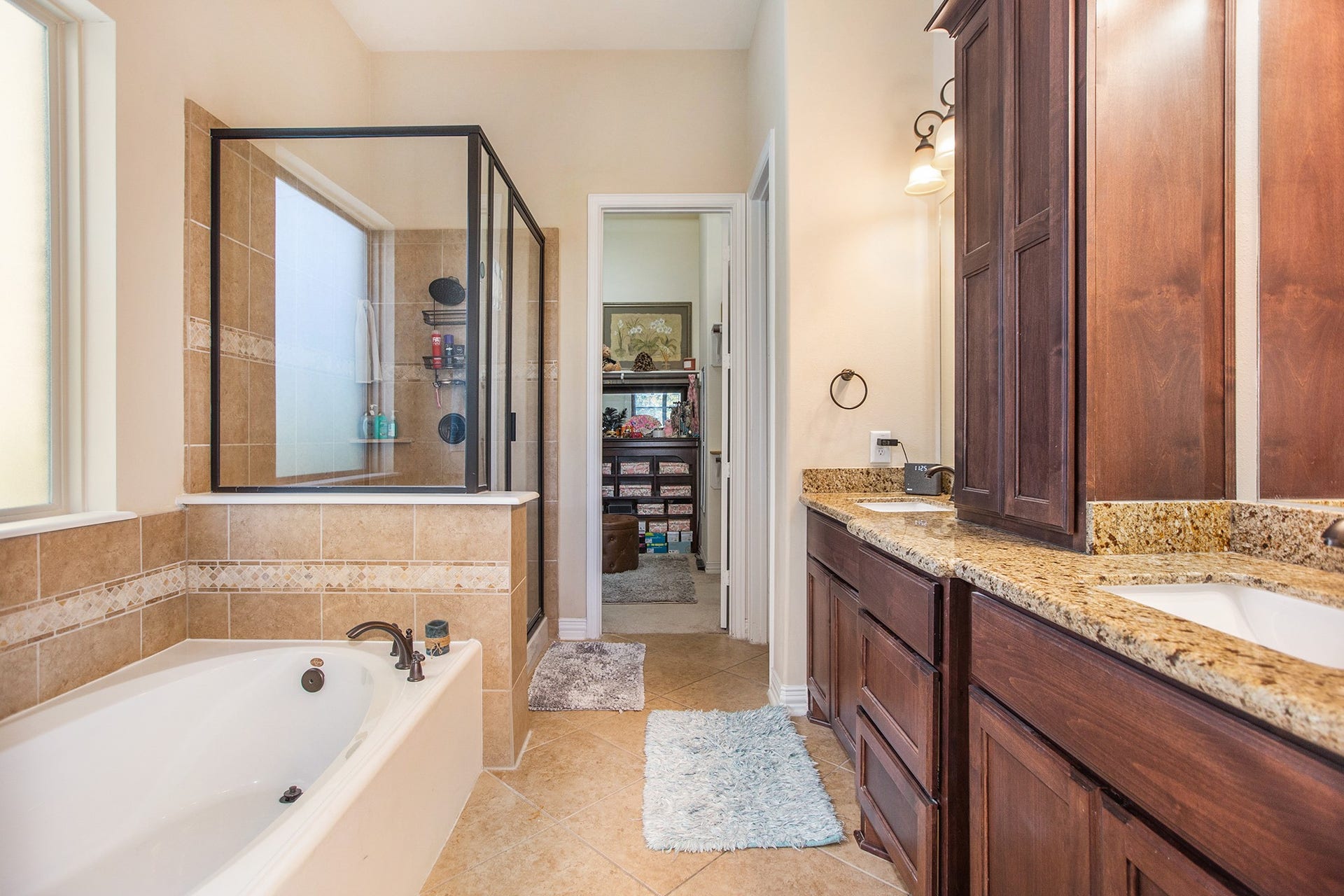 17931 Pecan Bayou Lane, Cypress, TX 77433 Master bathroom boasts a dual sink granite vanity with tons of storage.