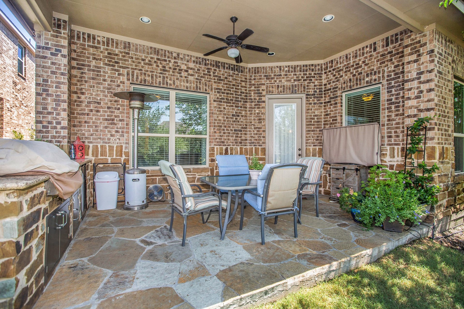 17931 Pecan Bayou Lane, Cypress, TX 77433 Covered back patio with outdoor kitchen.