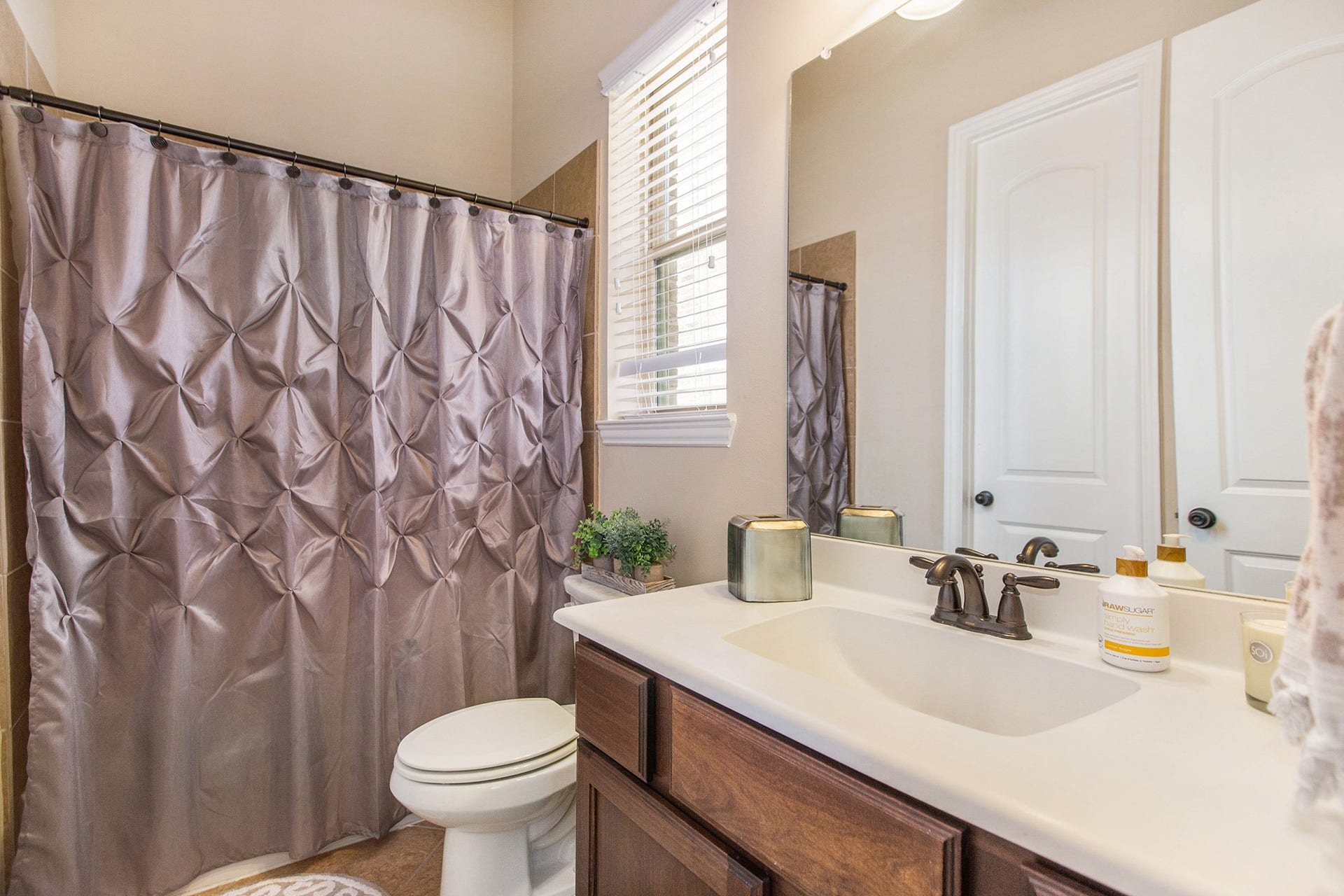 17931 Pecan Bayou Lane, Cypress, TX 77433 Secondary bathroom with a tub/shower combination.