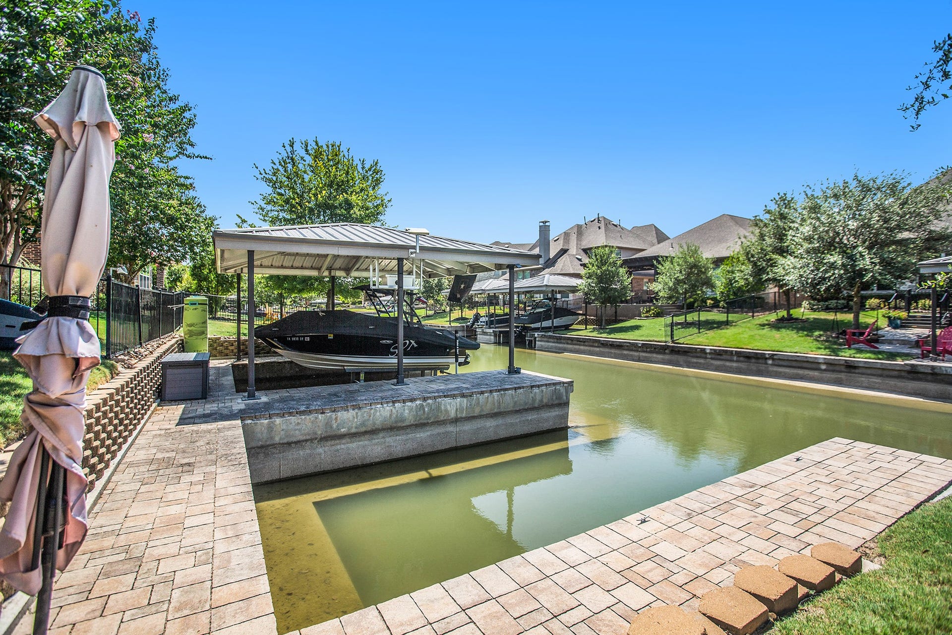 17931 Pecan Bayou Lane, Cypress, TX 77433 Private boat slip for your boat, paddle boards, kayaks, etc. The canal connects to the main lake.